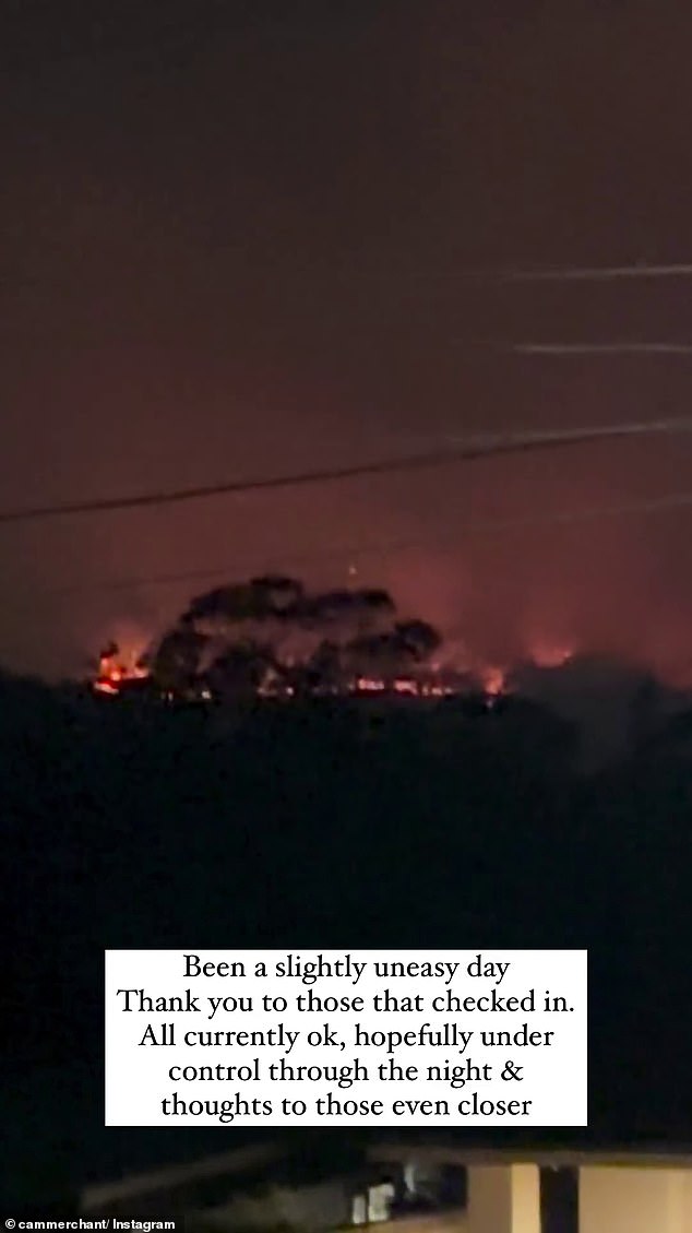 Later that day, Cam shared another photo of fires burning in the distance at night. 