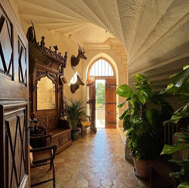 A charming entrance to the castle. Its new owners only discovered that the property is listed as historic after they bought it, meaning it needs to be renovated using the same methods it was originally built with.