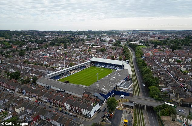 Two entrances to Luton Town Football Club's Kenilworth Road stadium are packed with terraced housing