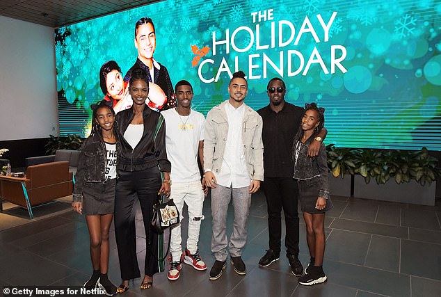 Porter (second from left) poses with her children and Combs on Oct. 30, 2018, about two weeks before her death.