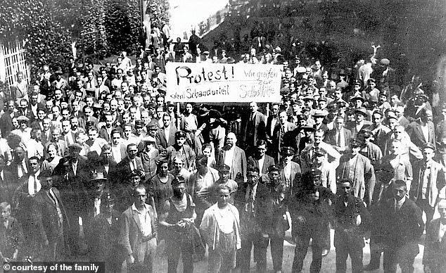 Steve Zakall in the center of the front row wearing dark trousers, white shirt and white jacket on July 15, 1927