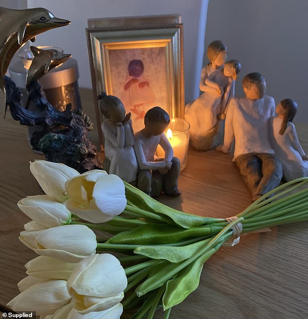 The heartbroken parents recall feeling lost after their daughter was born and, with no one to guide them, they were never able to hold her (pictured is the family memorial to Celeste)