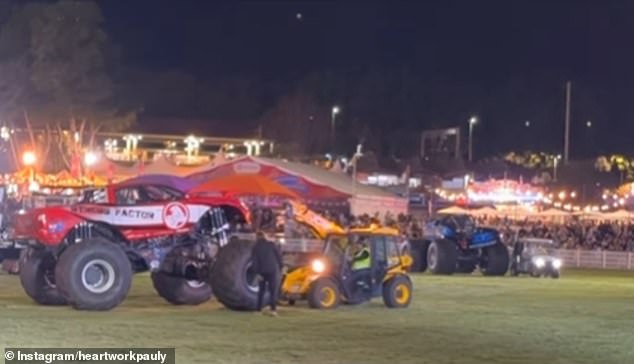 That same night, a red monster truck was performing a series of jumps, but broke down and had to be towed (pictured)