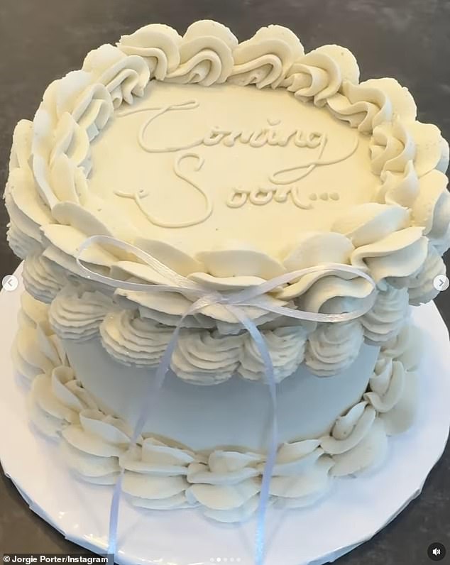 The star also shared a video of an elaborate cake covered in white icing that had 'Coming soon...' written on top.