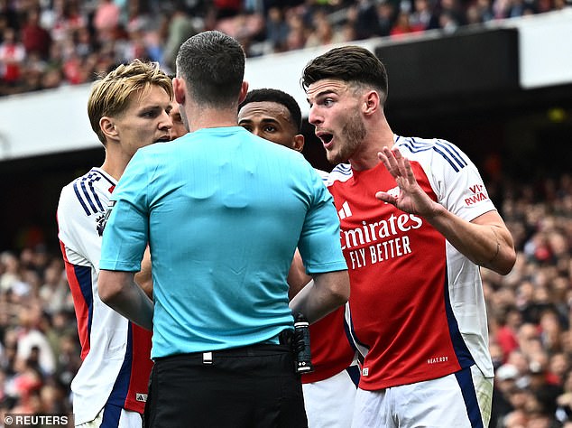 Arsenal have already received two red cards for kicking the ball out of play this season, after Declan Rice (right) received a second yellow for delaying a restart against Brighton.