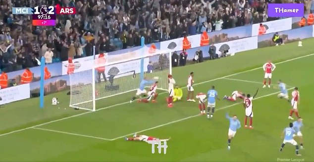 Arsenal can be seen picking the ball out of the net after John Stones' last-gasp equaliser.