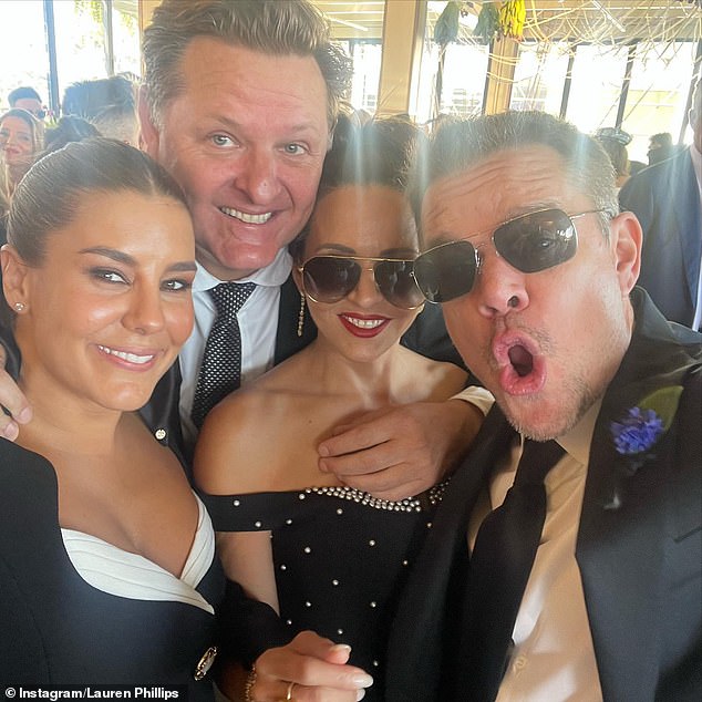 Phillips is building celebrity connections as she attends star-studded events with her fiancé Paul O'Brien (second from left), who flies stars around Australia with his private jet company.