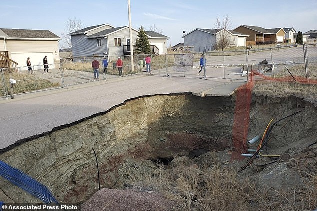 This photo taken on April 27, 2022 shows a sinkhole in the Hideaway Hills neighborhood near Rapid City.