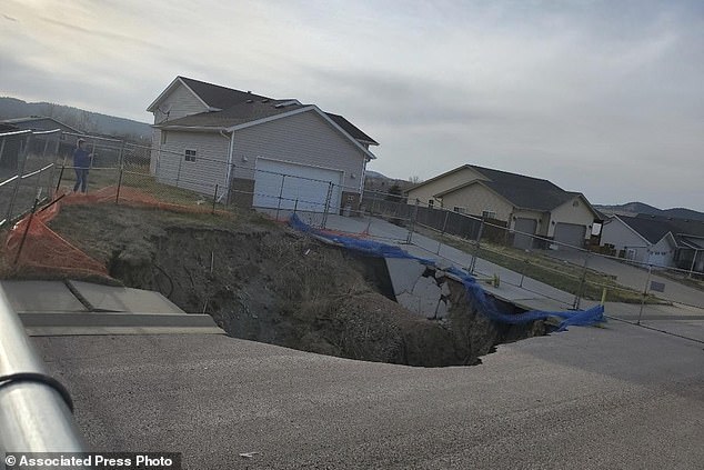 Another photograph by Tonya Junker shows the same sinkhole, which opened in 2020 as a result of work near a former mining site.