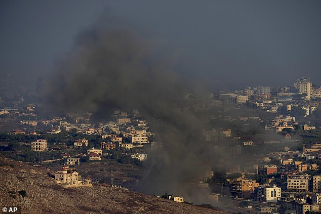 Smoke rises from an Israeli airstrike on the village of Kfar Rouman, as seen from the town of Marjayoun in southern Lebanon