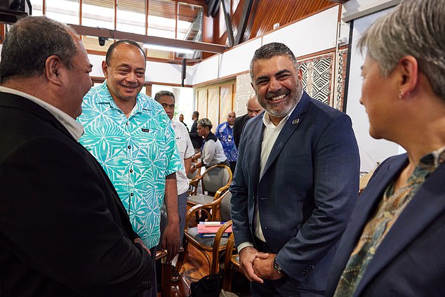 Justin Mohamed is pictured with Foreign Minister Penny Wong, both right, at a forum in Fiji in August.