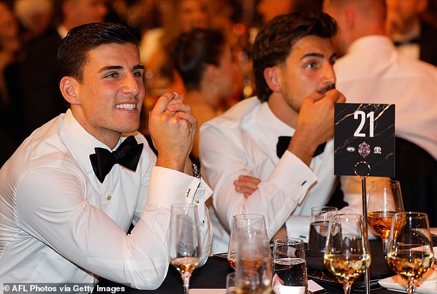 The Brownlow Medal ceremony began at 8pm on Monday night with AFL stars Nick Daicos (left), Marcus Bontempelli, Patrick Cripps and Lachie Neale competing for the prestigious award.