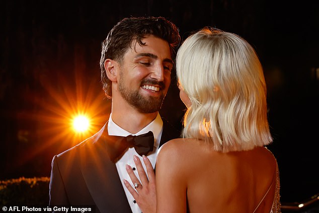 The model and AFL star, 25, looked absolutely smitten after getting engaged earlier this month.