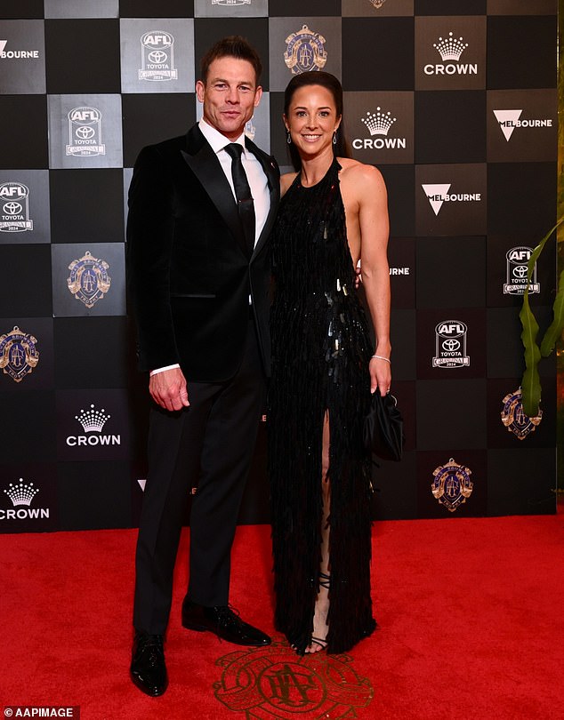 The former AFL player looked every bit the dapper gentleman as he walked the red carpet, proving to the world that he has turned his life around.