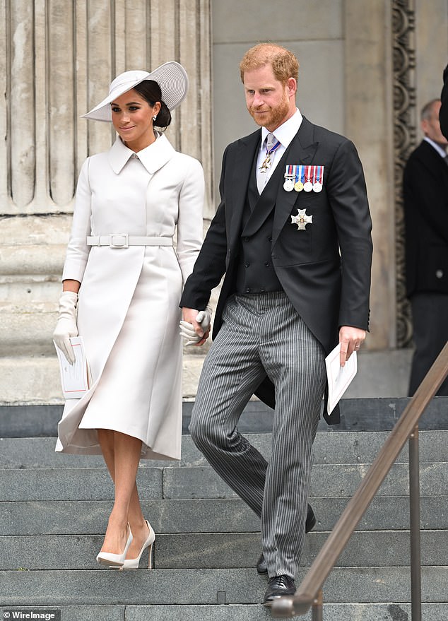 The Duke of Sussex's visa application was thrown into doubt after he admitted in his 2023 memoir to having used several drugs for recreational purposes, something he would have had to disclose on immigration paperwork. He is pictured with wife Meghan Markle in London in 2022