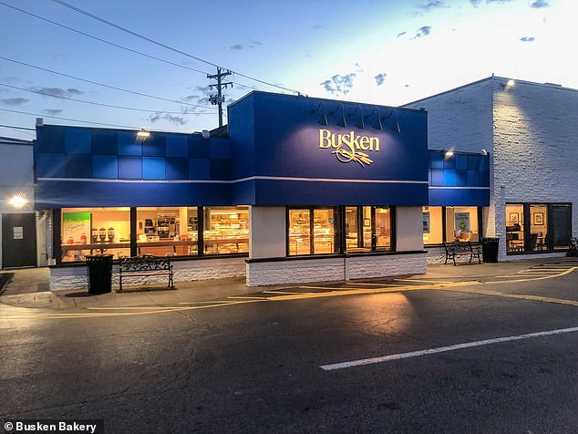 The store's various branches sell cookies with the faces of both candidates, as well as a third-choice 'Cookie Party' option with a smiley face, and keep count in an attempt to predict who will win in November.