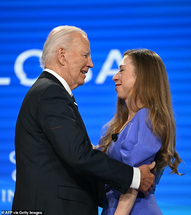 President Biden hugs Chelsea Clinton