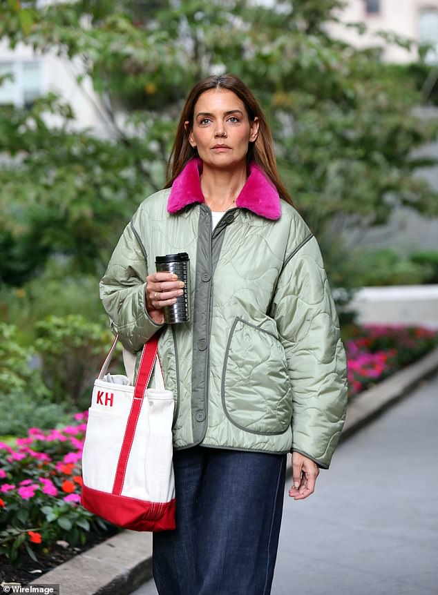 She accessorized her look with a Lands' End monogrammed Heritage Red tote bag featuring her initials, KH, which retailed for $35.