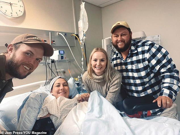 As part of Ms Cronjé's treatment, the speech therapist was given hormonal medication, which drastically reduced her chances of conceiving. Pictured: Ms Cronjé, her husband Roché, with Karla Steenekamp and Tjaart after the birth of Jack