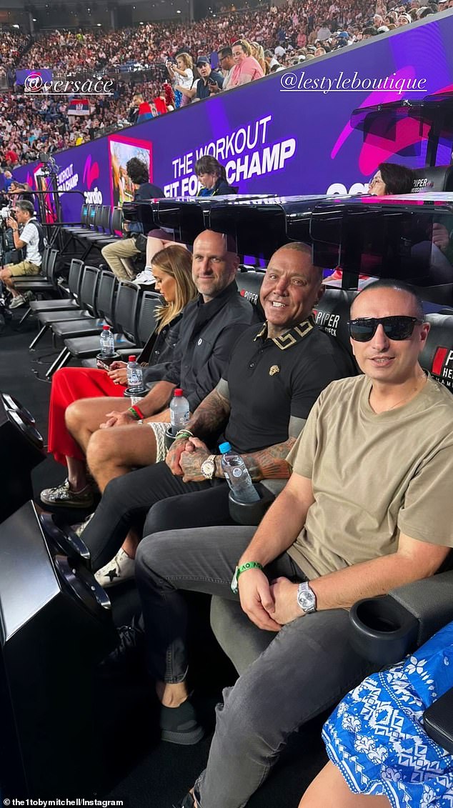 Toby Mitchell was pictured at the Australian Open tennis tournament in January, sitting in courtside seats alongside Bec and Chris Judd.