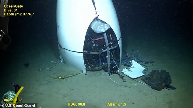 Experts said there was a faulty connection between the hull and the large titanium ring that allowed water to seep in through the front and break the submarine loose. The Titan's tail is seen on the seabed.