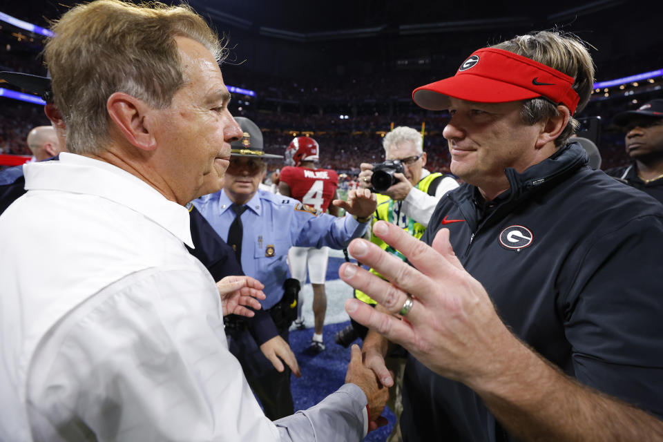 ATLANTA, GEORGIA - DECEMBER 02: Head coach Nick Saban of the Alabama Crimson Tide shakes hands with head coach Kirby Smart of the Georgia Bulldogs after defeating the Georgia Bulldogs 27-24 in the SEC Championship at Mercedes-Benz Stadium on December 2, 2023 in Atlanta, Georgia. (Photo by Todd Kirkland/Getty Images)