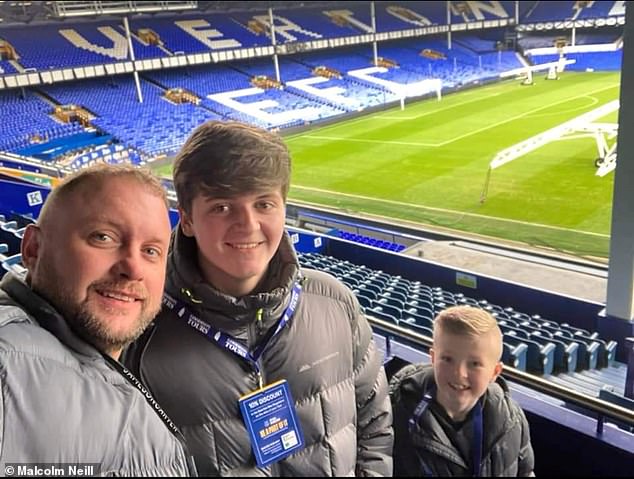 Chris Neill with his sons Reece, 17, and Archie, eight, at Everton's Goodison Park