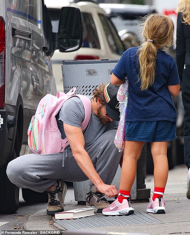 The veteran actor even carried her pale pink backpack over one shoulder as he took her to get ice cream.