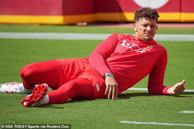 Chiefs quarterback Patrick Mahomes (15) stretches before the game on Sept. 15