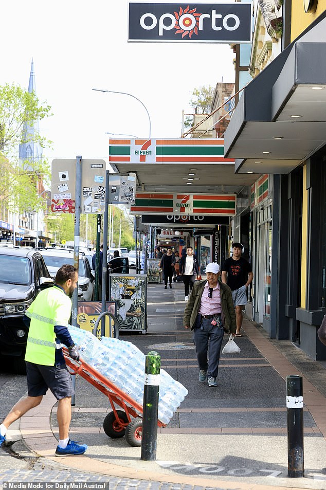 Sydneysiders strolling through Marrickville, a suburb in Sydney's inner west