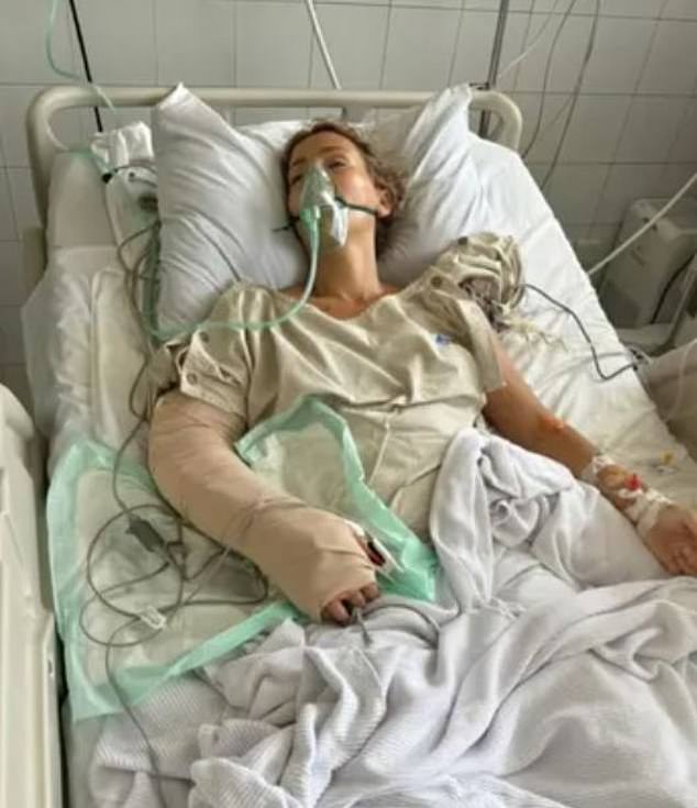 Charlene (pictured in hospital) received multiple blood transfusions as doctors battled to save her arm, but stopped treatment after learning her travel insurance company would not pay the medical bills.