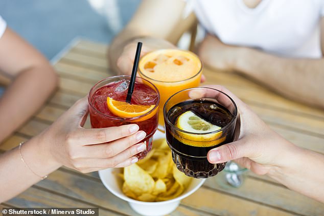 Experts say middle-class and younger drinkers are increasingly using non-alcoholic alternatives to moderate their drinking, often alternating between full-alcohol versions.