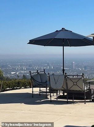 Kyle also flaunted the stunning views of the city from his pool.