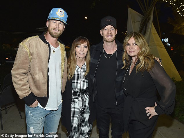 Spears has also previously criticized Tri Star's chief service officer Robin Greenhill, who was recently named in a civil lawsuit against Diddy by producer Rodney 'Lil Rod' Jones; (L-R) Brian Kelley, Robin Greenhill, Tyler Hubbard and Lou Taylor seen in 2018