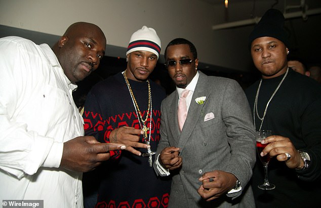 Big Joe (left) partying with rapper Cam'ron, Diddy and Huddy at Zac Posen's after-party during Olympus Fashion Week in 2005