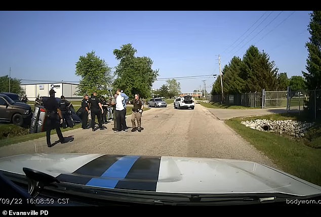 Casey White, wearing the white T-shirt, was serving a 75-year prison sentence for attempted murder and other crimes when he fled. He was also awaiting trial on charges of stabbing a woman to death during a robbery in 2015.