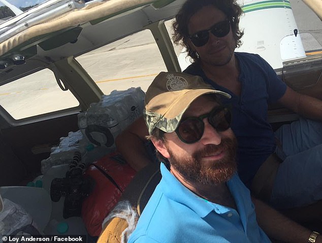 Loy on his plane with Kent delivering water after Hurricane Irma in 2017