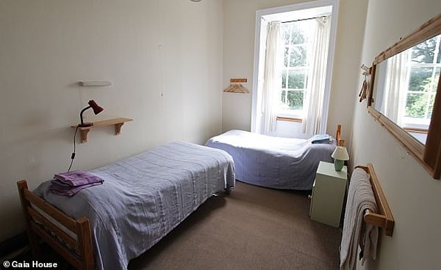 Caroline sleeps in a single room, but others sleep in shared double rooms (pictured) or in a five-bed dormitory.