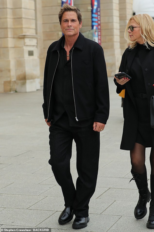 Rob Lowe was also seen strolling around Paris.