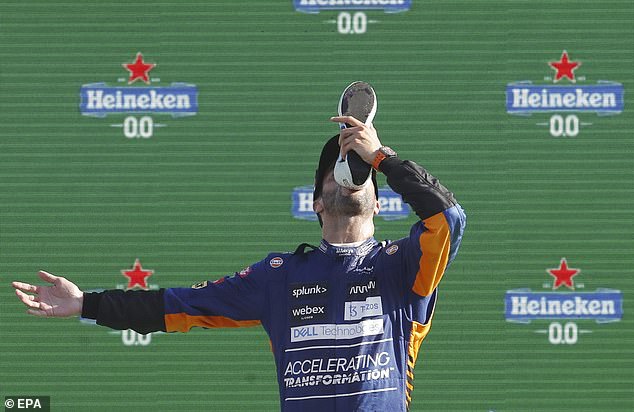 The 35-year-old Australian, pictured drinking champagne from his shoe while taking the podium at Monza in 2021, has won eight Grands Prix during his Formula One career.