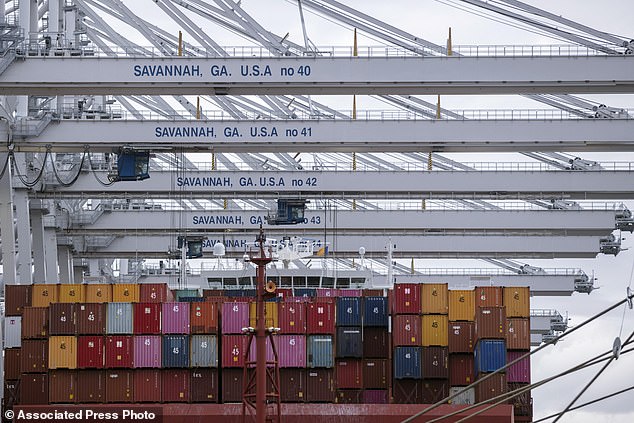 The move would also disrupt supply chains that were barely recovering from the pandemic, further fueling inflation and the cost of living. A ship loaded with containers is seen at the Georgia Ports Authority's Savannah Garden City Port terminal in Savannah, Georgia.