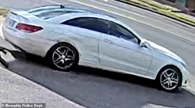 Surveillance footage shows the suspects fleeing in the stolen Mercedes Benz.