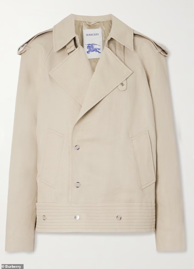 Comparatively, the Burberry coat (pictured) also has two pockets, shoulder and wrist tabs, but only has two buttons on the front and three on the bottom.