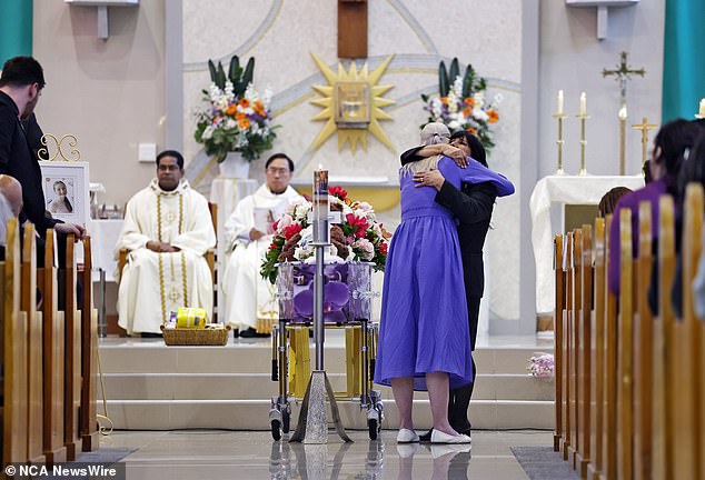 Charlotte's mother Kelly pictured during her daughter's funeral on Friday.