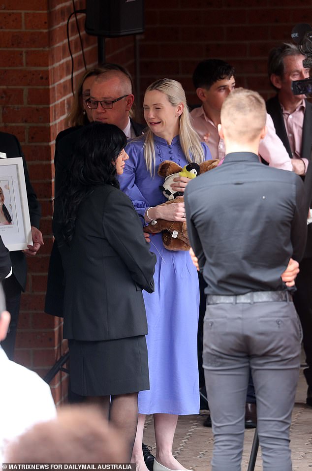 Charlotte's mother collapsed after the funeral, clutching stuffed toys given to her by her daughter's friends.