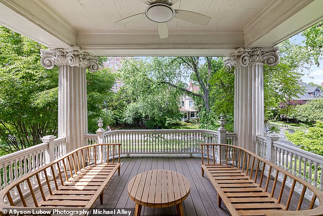 The beautiful property, built in 1910 and meticulously restored, has eight bedrooms, six full bathrooms, as well as a two-story porch and cinematic pilasters and columns.