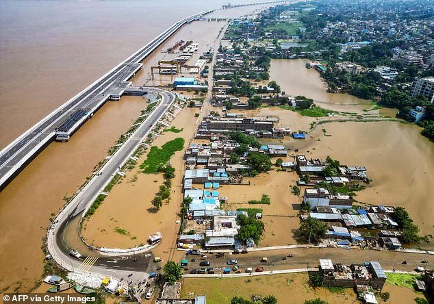 Houses partially submerged by Ganges River floods in Patna on September 20