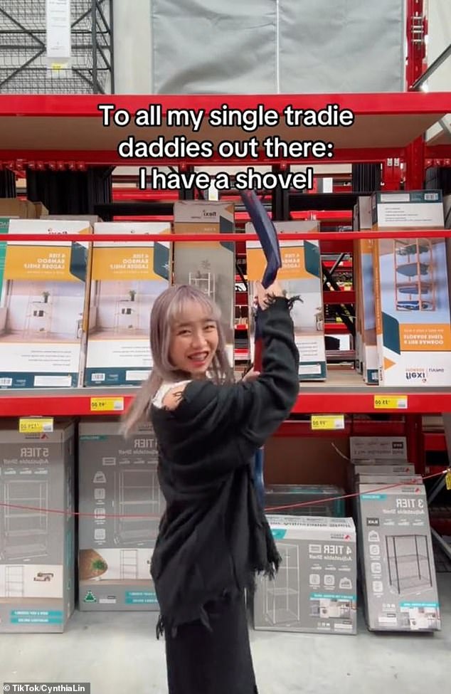 The content creator uploaded a video of her holding a shovel in a Bunnings store (pictured).