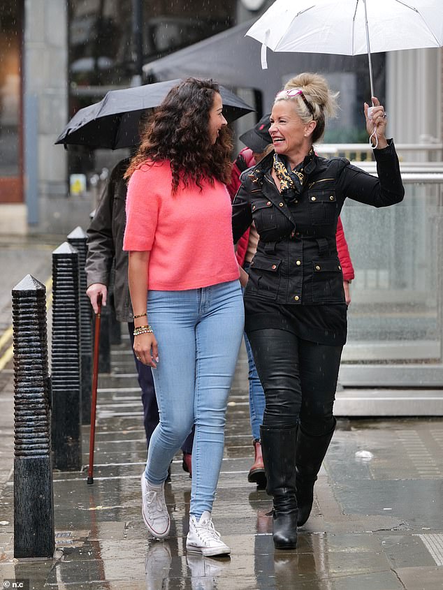 Katie and her bridesmaid looked in high spirits as they laughed their way to the store.