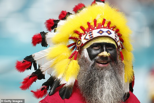 A Washington Redskins fan watches before the game against the Miami Dolphins in 2019.